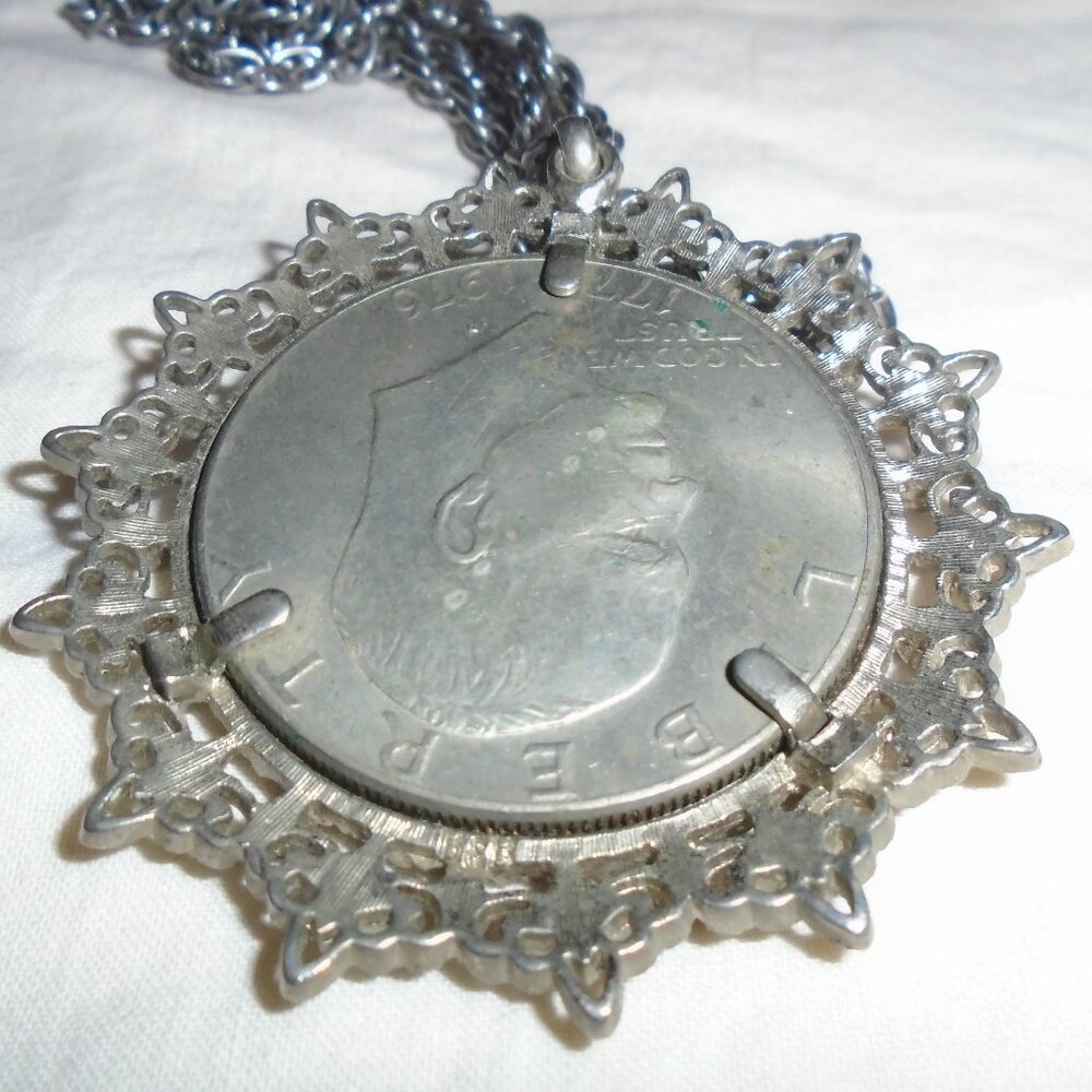 Eisenhower Silver Dollar in a Sterling pendant frame